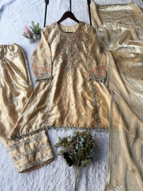 WhatsApp Image 2026-08-30 at 15.02.08.jpegiuoiuoi Champagne Gold Embroided 3pcs Shalwar